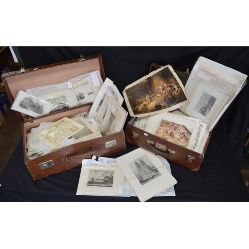 75 - Two suitcases containing a quantity of personal black & white photographs and etchings