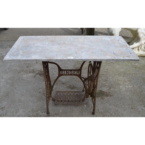 130 - Metal Singer sewing machine base with marble top - 107cm wide x 74cm tall