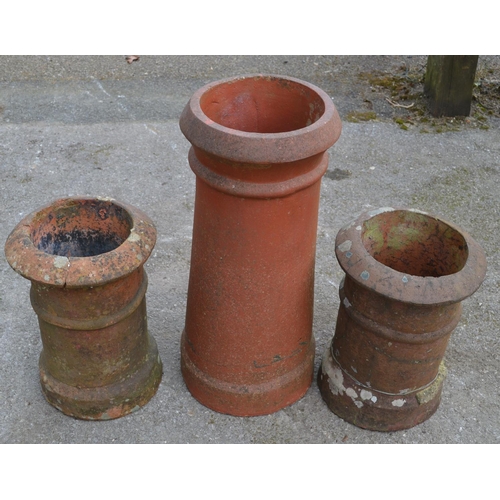 134 - Pair of short chimney pots - 40cm tall and one other 65cm tall