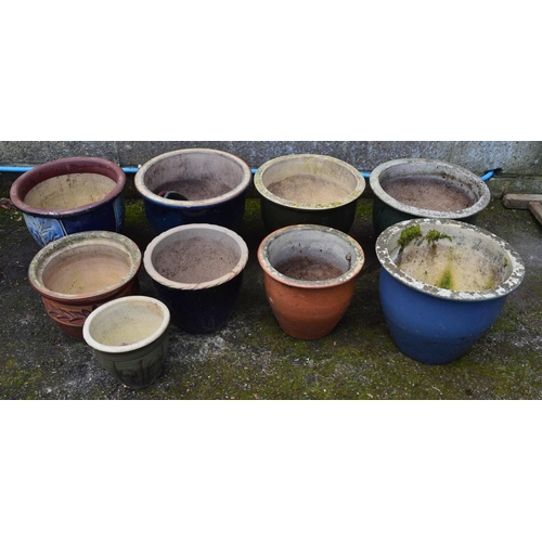 180 - Group of nine glazed plant pots of varying sizes