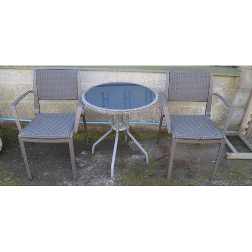 181 - Glass top circular bistro table - 64cm dia x 70cm tall together with two chairs