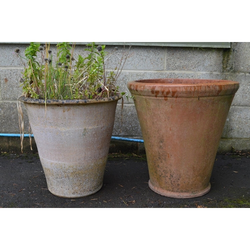 26 - Two fluted circular terracotta style plant pots - largest 54cm dia x 55cm tall