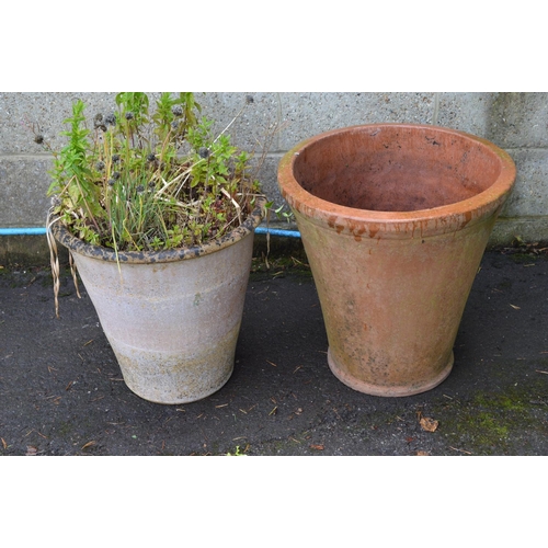 26 - Two fluted circular terracotta style plant pots - largest 54cm dia x 55cm tall