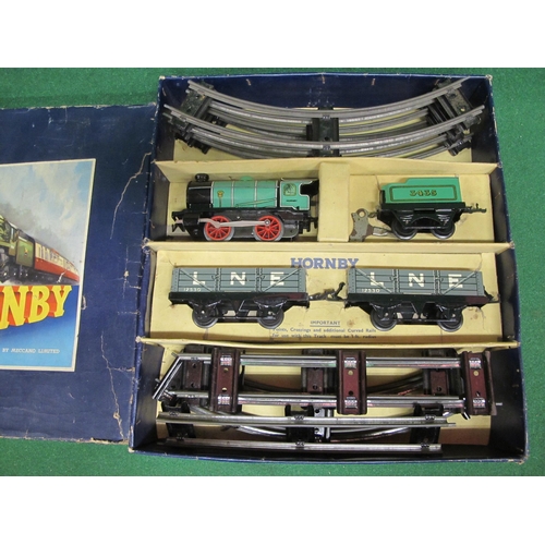 1940 s 1950 s Hornby O gauge tinplate clockwork M1 Goods Train set with green 0 4 0 tender locomotiv