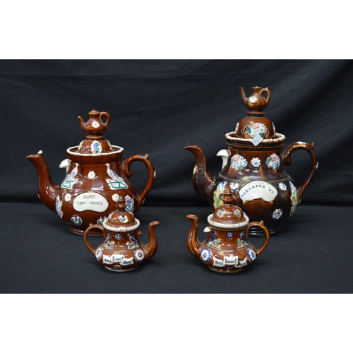 191 - Group of four Barge ware teapots the largest inscribed Remember Me - 31cm tall
