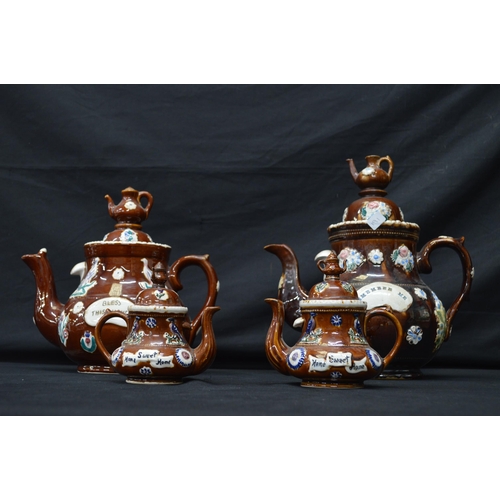 191 - Group of four Barge ware teapots the largest inscribed Remember Me - 31cm tall