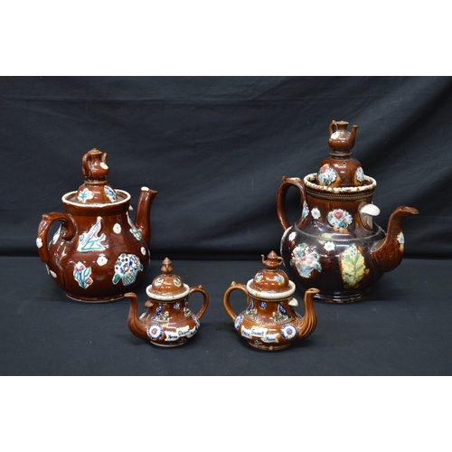 191 - Group of four Barge ware teapots the largest inscribed Remember Me - 31cm tall