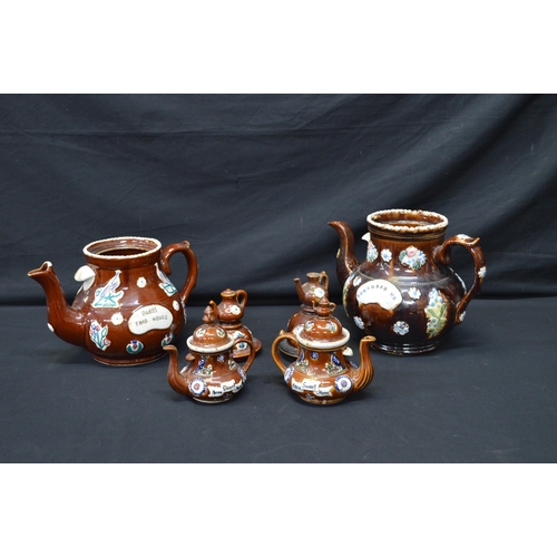 191 - Group of four Barge ware teapots the largest inscribed Remember Me - 31cm tall