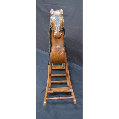 Hardwood rocking horse with brass inlay and padded saddle - 98cm tall