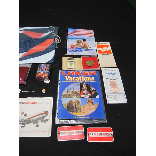 108 - Quantity of airline merchandise and memorabilia to include: two 1990's Virgin Atlantic cabin packs i... 