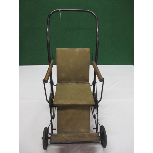 215 - Old folding metal, wood and canvas child's push/wheel chair with solid tyred wheels - 33