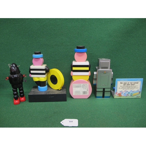 224 - Two plastic Bertie Bassett Liquorice Allsorts containers, a tinplate clockwork robot, robot biscuit ... 