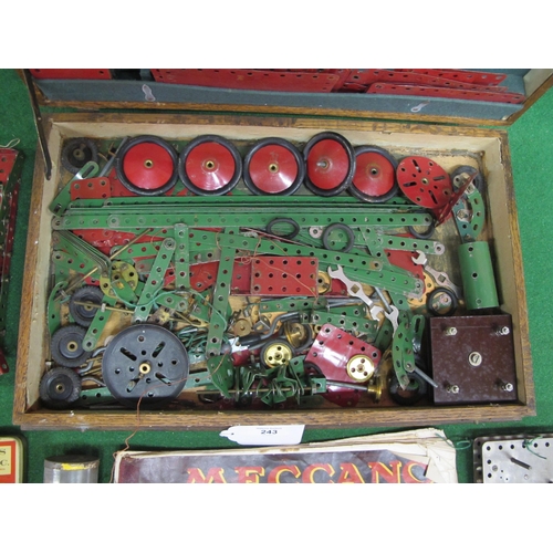 243 - Old wooden cutlery box containing a quantity of Meccano parts, clockwork motor and instructions for ... 