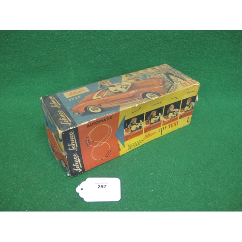 297 - Boxed Schuco Texi 5735 clockwork remote control (missing) tinplate car with lady driver - 9.5