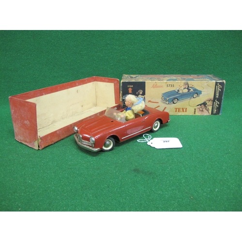 297 - Boxed Schuco Texi 5735 clockwork remote control (missing) tinplate car with lady driver - 9.5