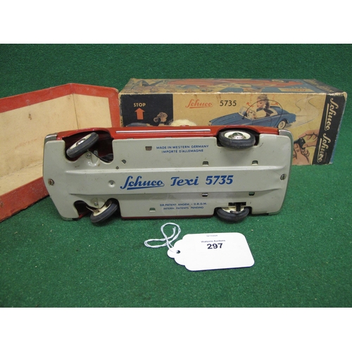 297 - Boxed Schuco Texi 5735 clockwork remote control (missing) tinplate car with lady driver - 9.5