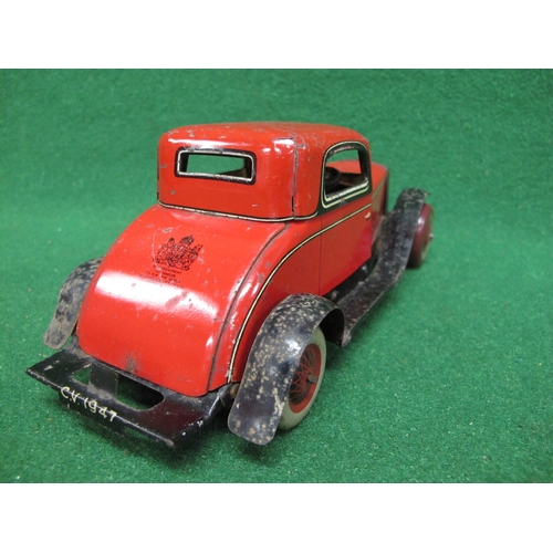 302 - Chad Valley tinplate clockwork two seater saloon in red livery with Royal Warrant on the boot - 10