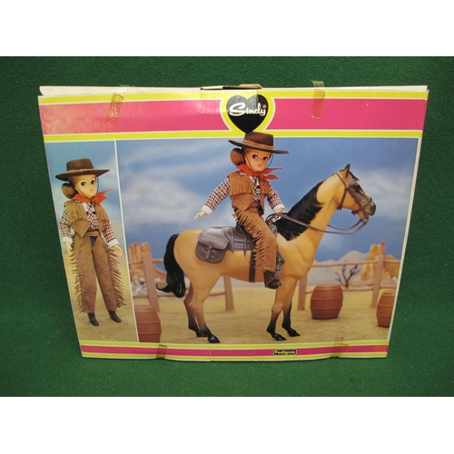 311 - Boxed Sindy by Pedigree Western Set containing a Sindy, horse, clothing, boots, hat, saddlery and th... 