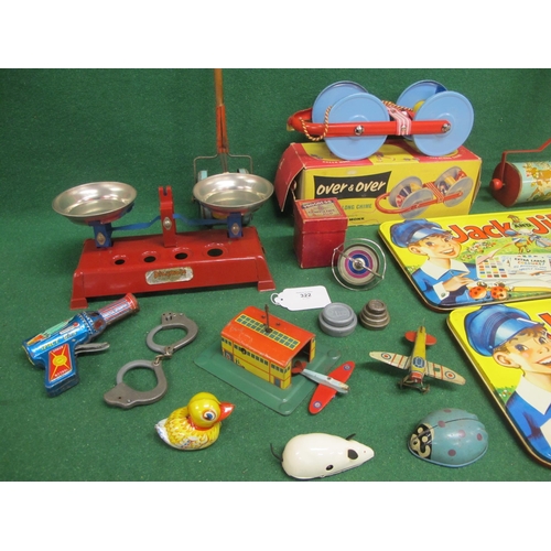 322 - Collection of tinplate and metal toys to include: Playmate scales, Push-a-long chimes, hand guns, sm... 