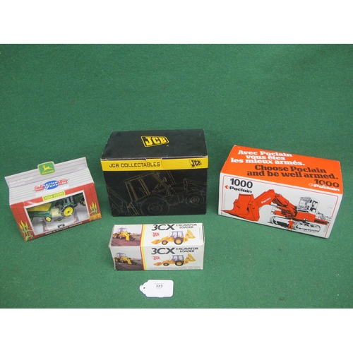 323 - Four boxed construction/agricultural collectables to comprise: JCB ceramic Fastrac money bank and a ... 