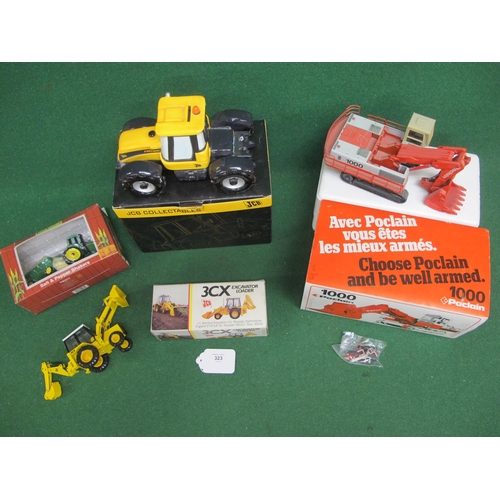 323 - Four boxed construction/agricultural collectables to comprise: JCB ceramic Fastrac money bank and a ... 