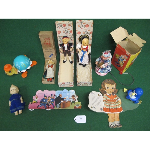 327 - Three boxed Foreign dolls, small Rosebud doll, pull-a-long Fisher-Price tortoise, boxed clown with c... 