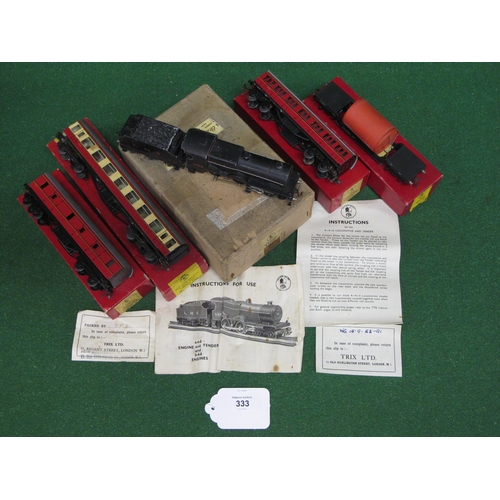 333 - Five boxed Trix Twin items to include: 4-4-0 tender locomotive No. 1168 in LMS black, Parcels van, 1... 