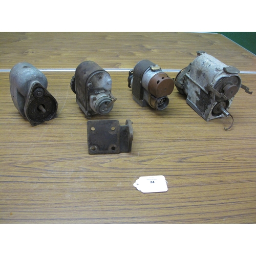 34 - Four 1930's/1940's magnetos to comprise: Dynomag for a single cylinder motorcycle, a four cylinder v... 