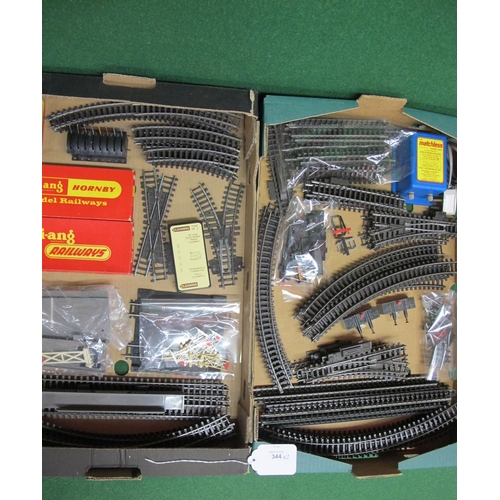 344 - Two boxes of loose Triang Super 4 track parts (approx ninety seven items), two boxed points and a mo... 