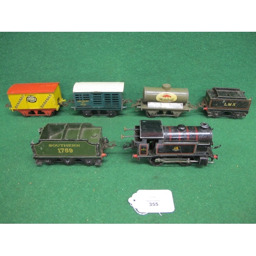 355 - Loft find three suitcases of loose playworn Hornby O gauge to comprise: seventeen wagons, a BR 0-4-0... 