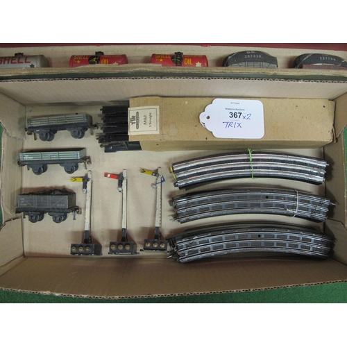 367 - Two boxes of Trix Twin railway to include: a Cadet train set box, two 0-4-0T locomotives, eleven wag... 