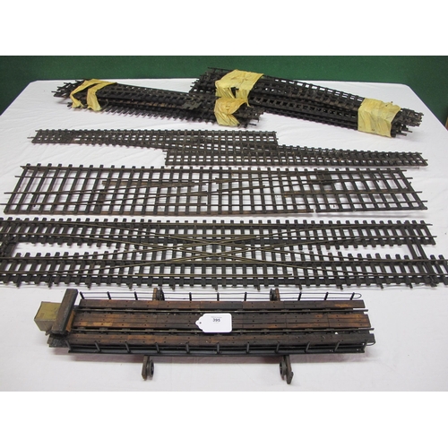 395 - Large quantity of Gauge 1 metal and wood track with straights, curves, straight & curved turnouts, d... 