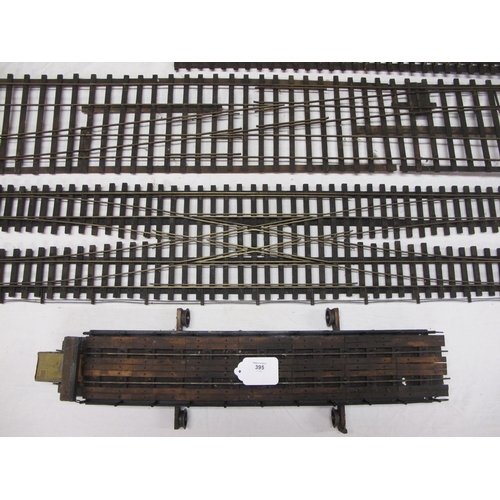 395 - Large quantity of Gauge 1 metal and wood track with straights, curves, straight & curved turnouts, d... 