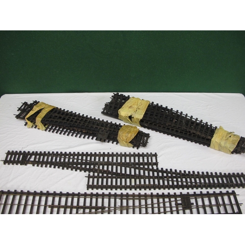 395 - Large quantity of Gauge 1 metal and wood track with straights, curves, straight & curved turnouts, d... 