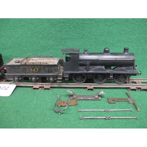 402 - Two O Gauge metal 3 Rail electric tender locomotives to comprise: 4-4-0 now painted in lined black a... 