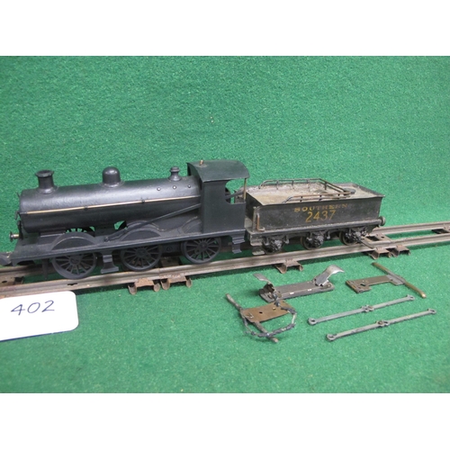 402 - Two O Gauge metal 3 Rail electric tender locomotives to comprise: 4-4-0 now painted in lined black a... 