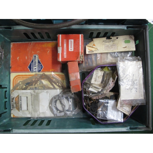 5 - Two crates of vintage tractor parts, spares and steering wheel together with gasket sets and spares ... 