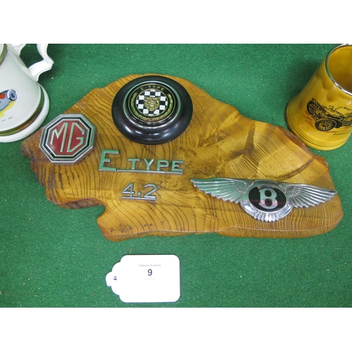 9 - Wooden plaque with MG, Jaguar, Bentley and E Type 4.2 badges attached together with two china Vetera... 