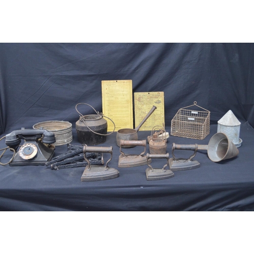 177 - Group of sundry items to include: four flat irons, three iron shelf brackets, Bakelite telephone, wi... 