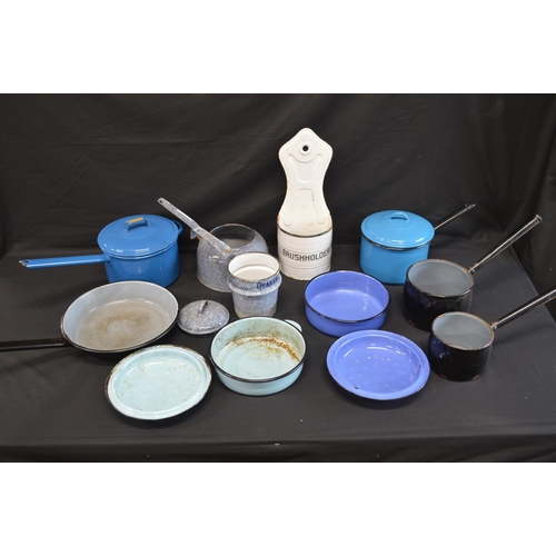 191 - Collection of enamelware to include: wall hanging brush holder, Quaker Oats cooking pan and sauce pa... 
