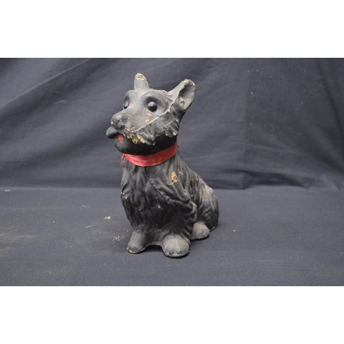 196 - Two spelter figures of seated dogs - 19.5cm x 16.5cm tall together with two Made in Scotland figures... 