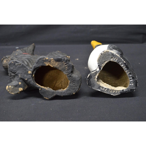 196 - Two spelter figures of seated dogs - 19.5cm x 16.5cm tall together with two Made in Scotland figures... 