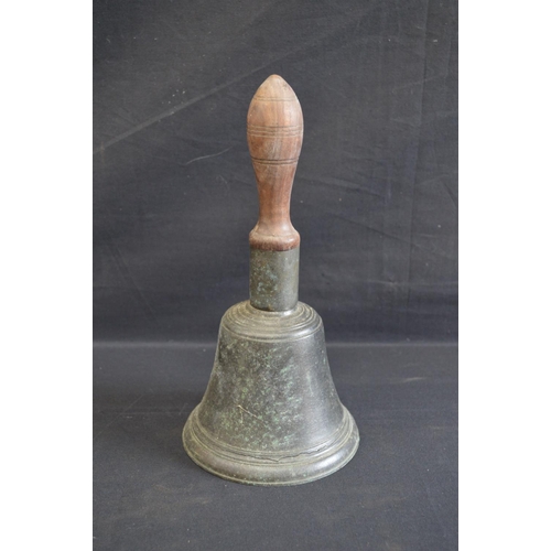 199 - Group of five iron trivets together with a hand bell and finger plates etc