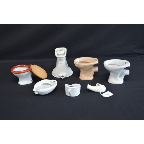 210 - Ceramic Oxford Rd No. 183000 salesman's toilet bowl - 13.5cm tall together with three other miniatur... 