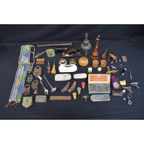 215 - Collection of sundry items to include: glass beadwork belt, padlocks & keys, desk stamp and Rolls ra... 