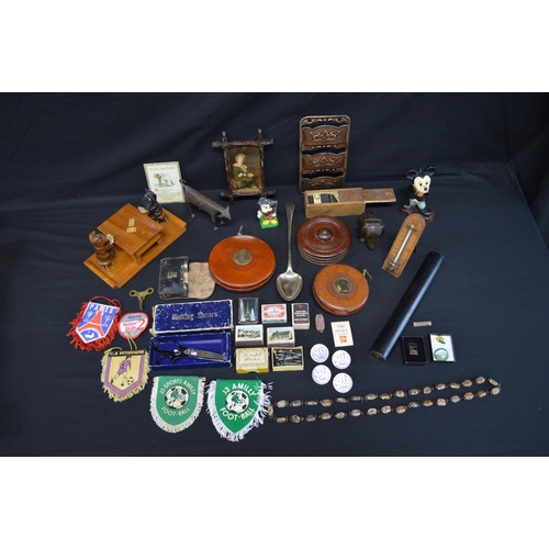 218 - Collection of sundry items to include: two leather tape measures, opera glasses, Mickey Mouse candle... 