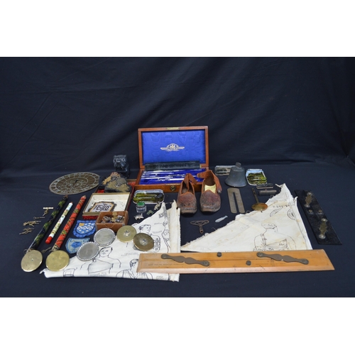 220 - Collection of sundry items to include: pair of leather top clogs, watch keys, Naval badges and brass... 