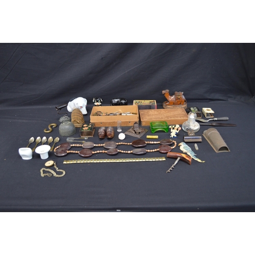 221 - Collection of sundry items to include: dog form pin cushion, matchbox holders, paper clip, eye bath ... 