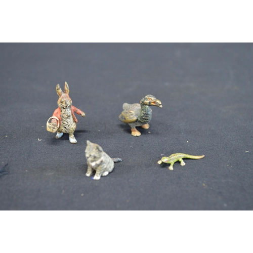 227 - Group of four cold painted bronze figures to comprise: Peter Rabbit - 4cm tall, lizard, kitten and g... 
