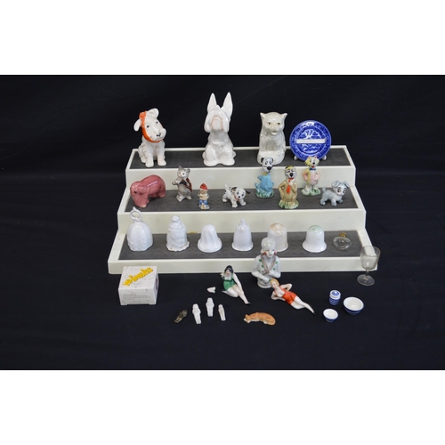 234 - Group of Disney and other Wade Whimsies together with two Beswick dogs, candle snuffers and a miniat... 